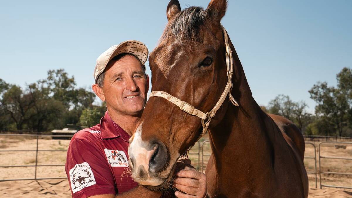 Fab's Cowboy with his Barcaldine based trainer Bevan 'Billy' Johnson. Picture by Racing Queensland.