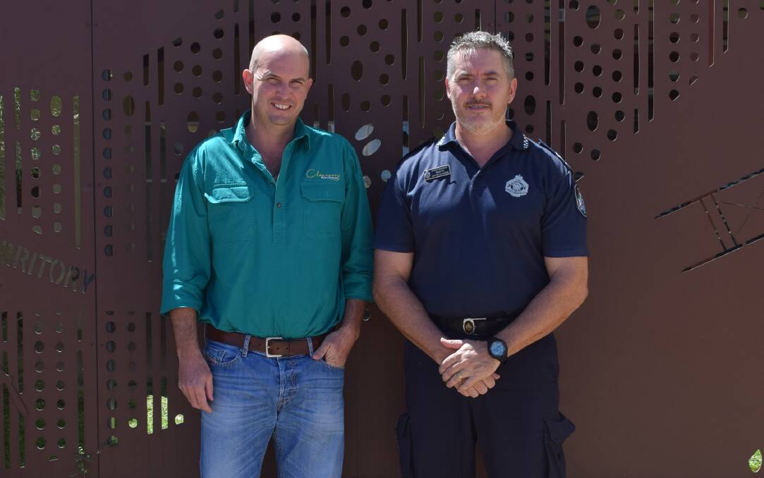 DETERMINED: Cloncurry mayor Greg Campbell and Cloncurry Police Station's officer-in-charge, Senior Sergeant Brad Rix, announce a reward to track down culprits of break-and-enter. Photo: Contributed.