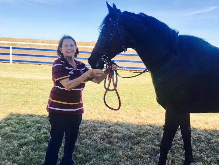 Trainer Denise Ballard with Travel in Style, who won the South 32 Open Handicap. Photo: Briarley Fitchett/Julia Creek Turf Club. 