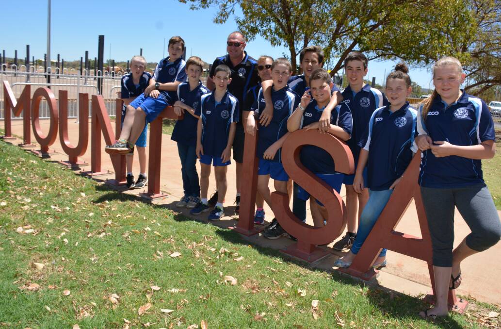 EXCITED: The Happy Valley State School students depart from the Mount Isa Airport on Tuesday to compete in the T20 in Brisbane. Photo: Chris Burns. 