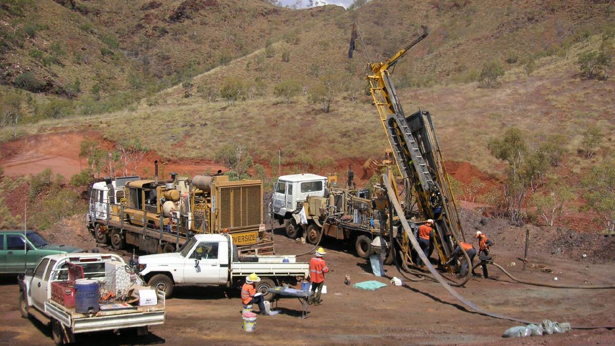 Queensland Mining Company drill at one of their sites. Photo: QMCL. 