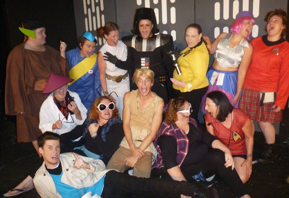 WILDCARDS: The cast of the Mount Isa Theatrical Society's The Umpire Strikes Back assemble. Major characters are parodies of Star Wars characters, but are joined by Gadget (front) and other novelty stage guests. Photo:  MITS.
