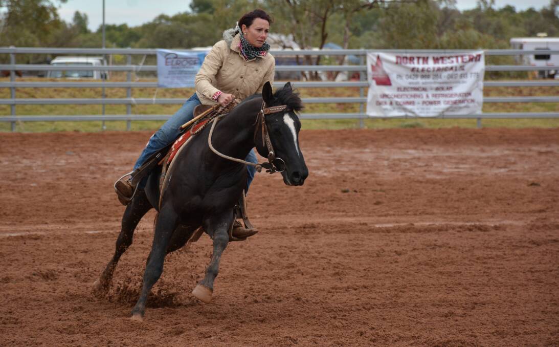 ENCOURAGEMENT DRY WORK: Kim Evans, from Willow Tree, NSWs, rides Royalle Imprint in the Cloncurry Stockman's Challenge. Photo: Chris Burns. 