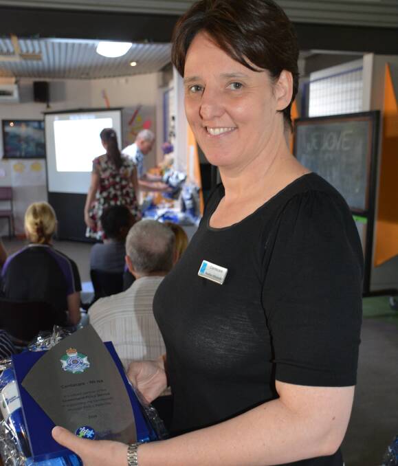 ACKNOWLEDGED: Centacare representative Heather Alexander accepts recognition from QPS for the organisation being involved in the local referral program. The ceremony was held at the PCYC. Photo: Chris Burns. 