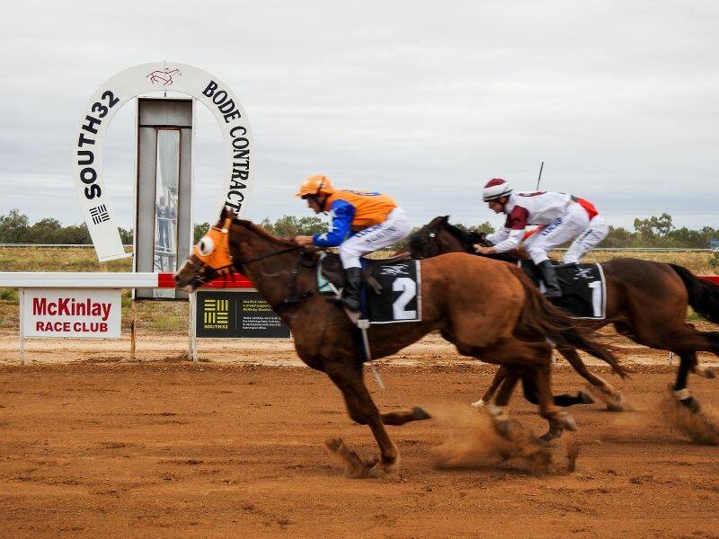 CROSSING THE POST: A close contest in a previous McKinlay Races event. There are six races at the track on Saturday. Photo: Heather Moore. 