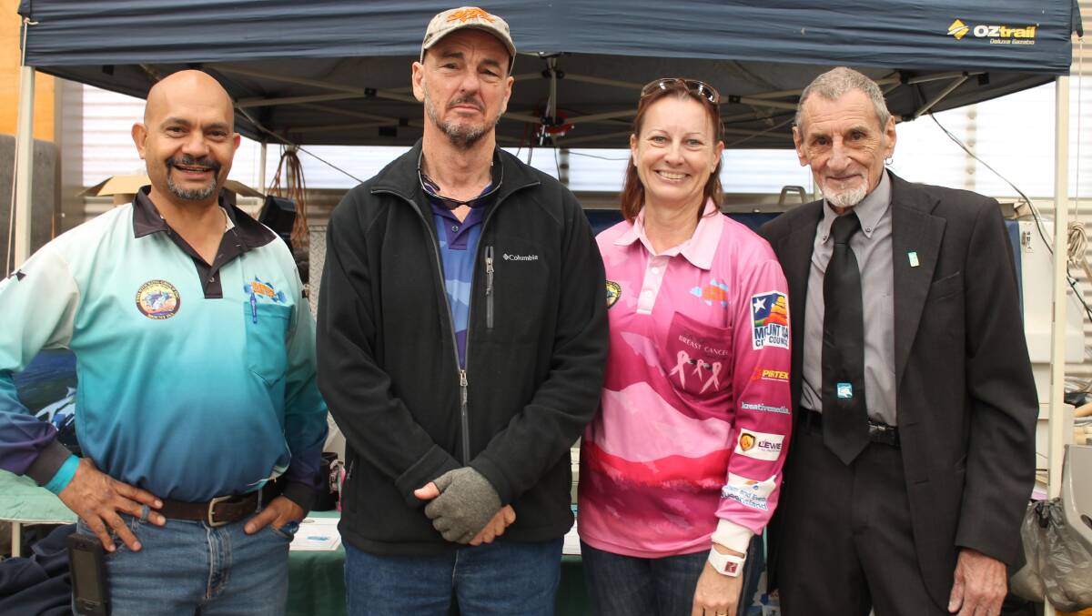 FISH STOCKERS: George Fortune, Inspector Trevor Kidd and Lyn Kidd, with Buffs Club president Jim Bowden at the 2015 Mount Isa Show. 