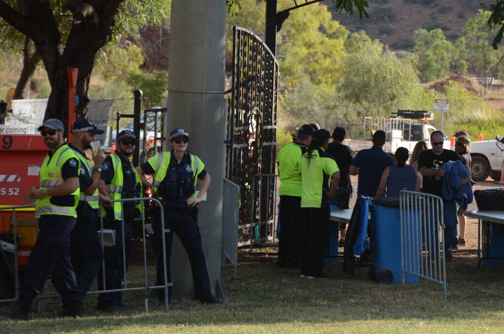 BUSY: Queensland Police Service officers and security see 7000 people walk through the gate at Tony White Oval during One Night Stand on Saturday. Photo: Chris Burns.  