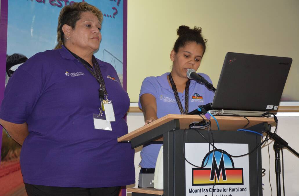SPEAKING ON LOCAL IMPACTS: Are You Remotely Interested in Rural and Remote Workforce speakers Leann Shaw and Stephanie King give a presentation on the community response to methamphetamine at a Mount Isa Centre for Rural and Remote Health lecture room. Photo: Chris Burns. 