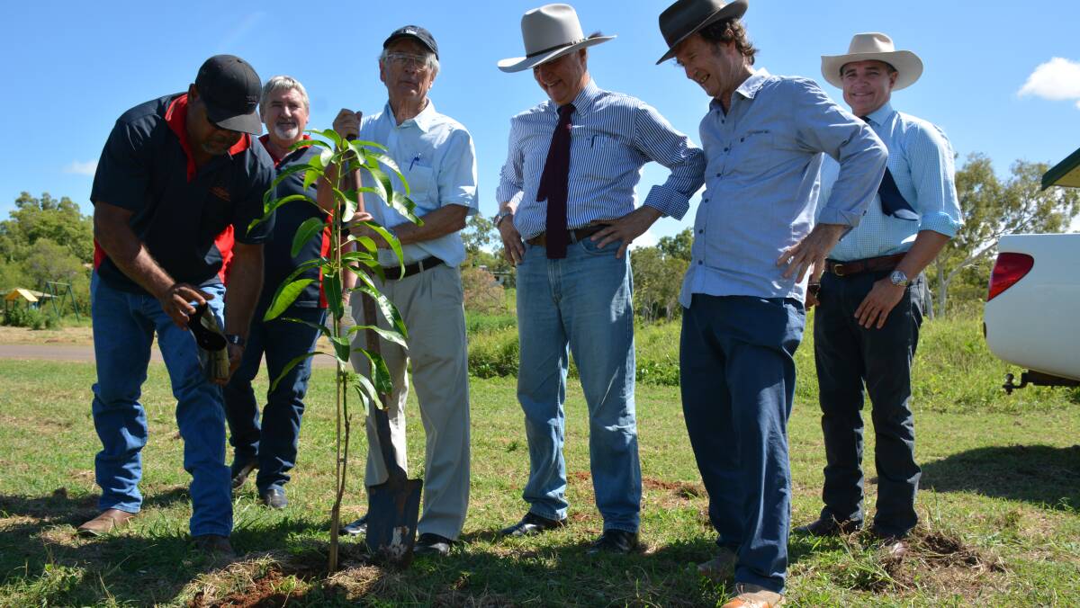 THE WORK BEGINS: Mayor Brad Wilson, Council CEO Frank Mills, Dick Smith, Federal Member Bob Katter, radio presenter Macca and State Member Rob Katter launch the community garden. Photo: Chris Burns. 