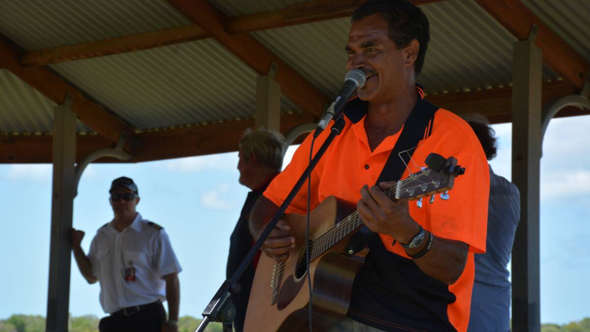 MUSO: Resident Charlie Anderson performs a song he wrote to the Mornington Shire community. Photo: Chris Burns 