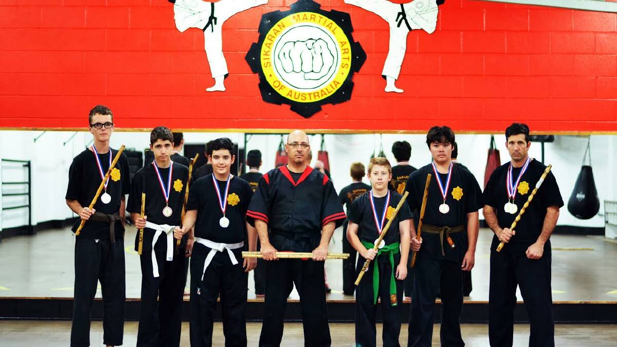 Sikaran Martial Arts students who attended nationals includes Zane Street, Bailey Cliff, Patrick Roche, with senior instructor Enzo Trigila, Loxley Marsh, Chris Stephens and Dallas Farnsworth. Photo: Chris Roche. 
