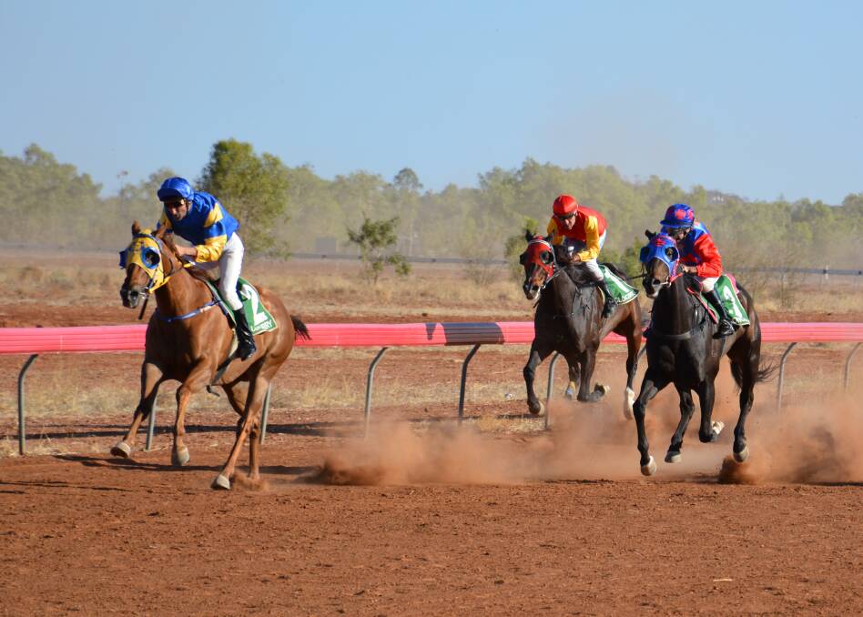 Carry Me, Isle Be Ready and Holey Gadoley nearing the end in the Brodie Hardware Cloncurry Cup Open Handicap 1400 metres.