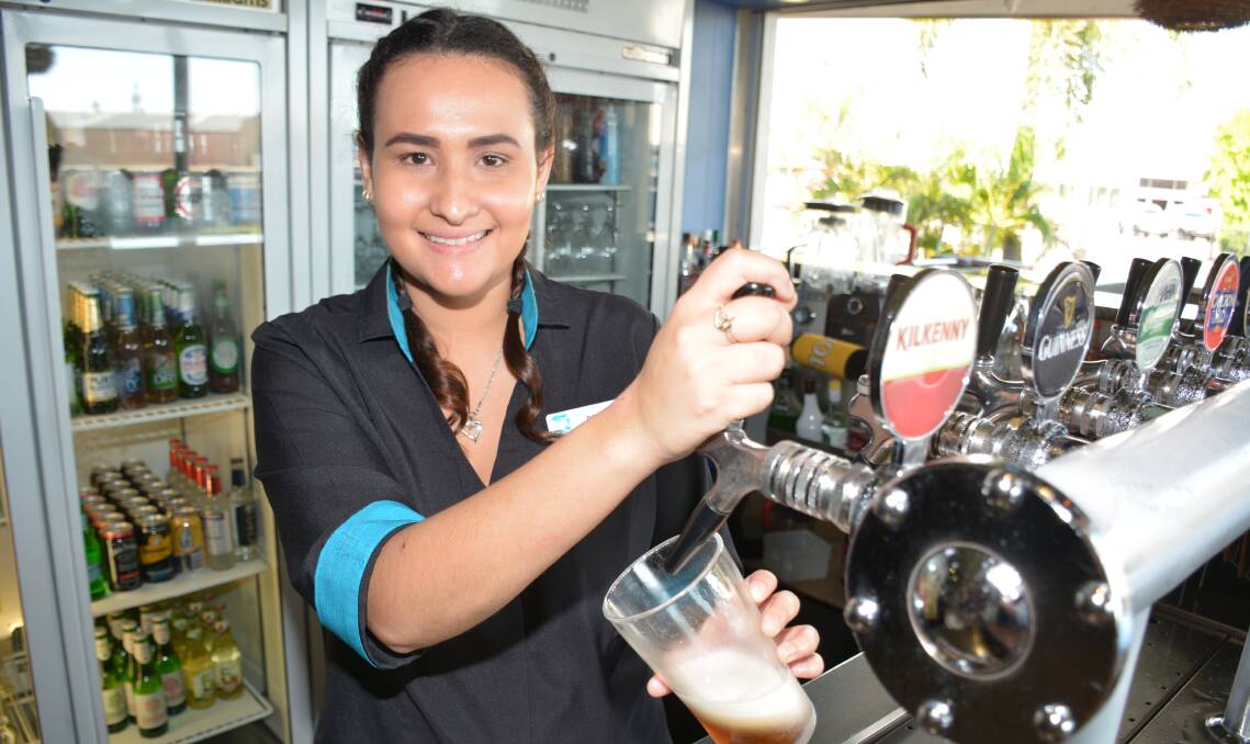 ON THE JOB: Buffs Club bartender Bernie Wynne practises for the weekend rush. The Buffs have a DJ on Friday and Saturday nights. Photo: Chris Burns. 