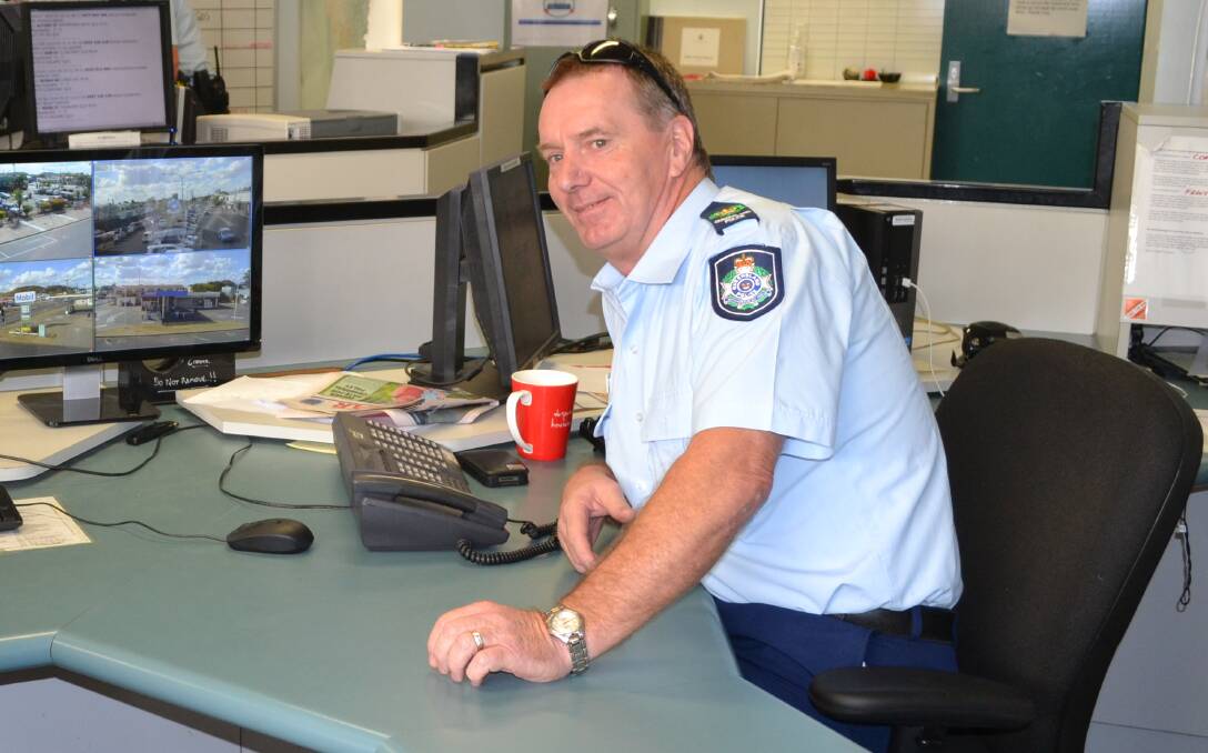 NO DESK JOCKEY: Mount Isa Police Station's retiring officer-in-charge, Senior Sergeant Col Henderson, is out in the field as often as possible. 