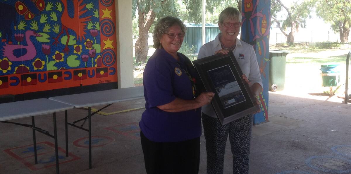 Award ceremony: Minnie Kenna is presented as a Legend by Councillor Anne Seymour. Photo: Contributed. 