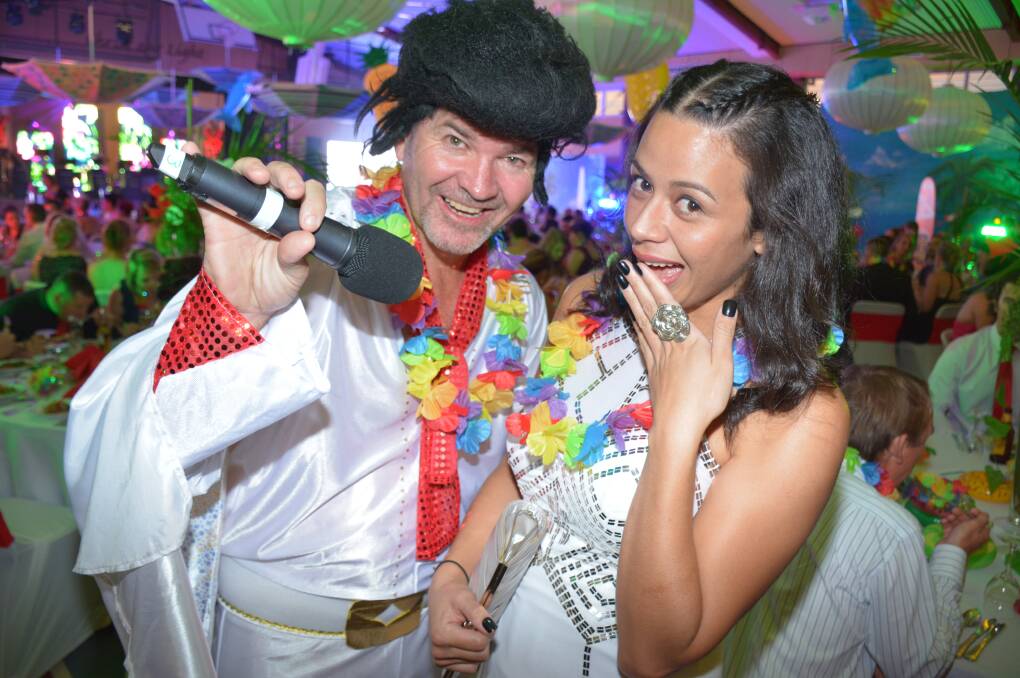  Elvis (Brian Atherinos) and Astrid Ripley party at the charity ball on Saturday night. Photo: Chris Burns. 