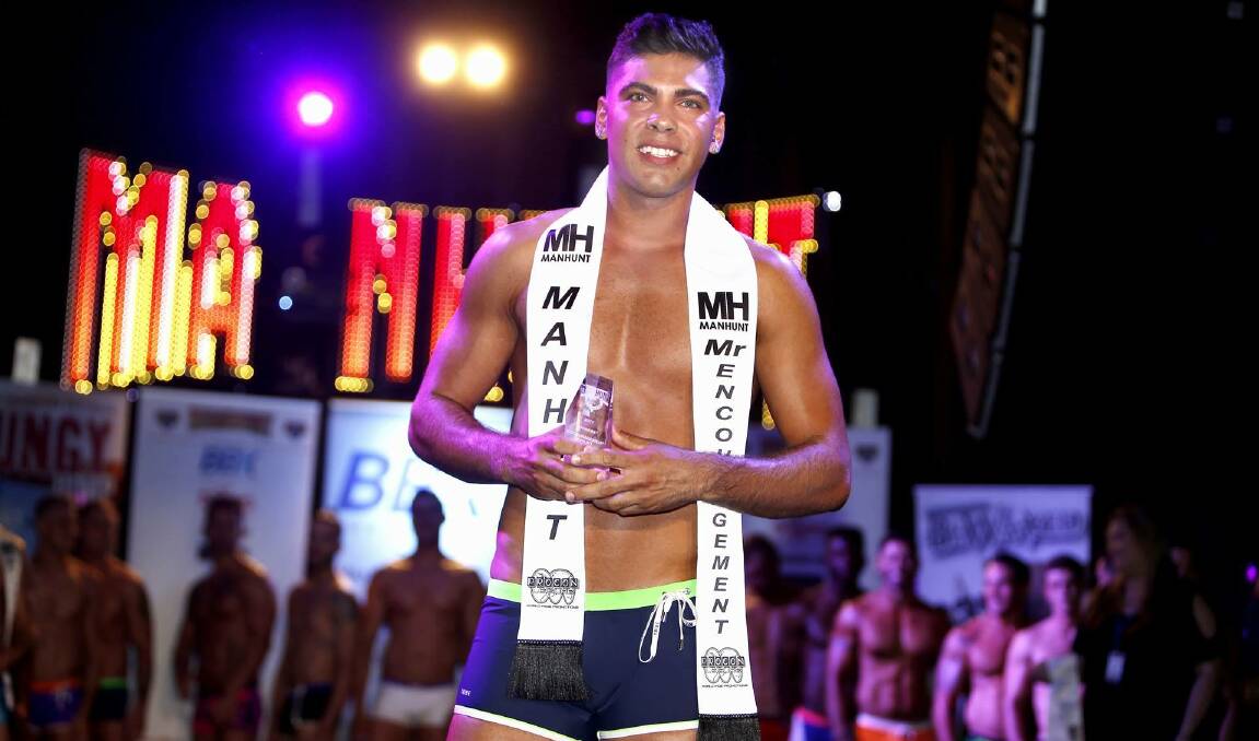 ENCOURAGED: Mount Isa local Dale Maher is announced as Manhunt Australia's Mr Encouragement at the end of the national finals in Cairns. Photos: Richard Mamando. 