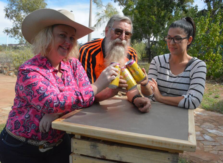  CHEERS: Mount Isa Rotary Rodeo manager Natalie Flecker, Mount Isa Men's Shed coordinator Richard Lane, and Andii Mihay Events stylist Jen Termine-Toth. 
