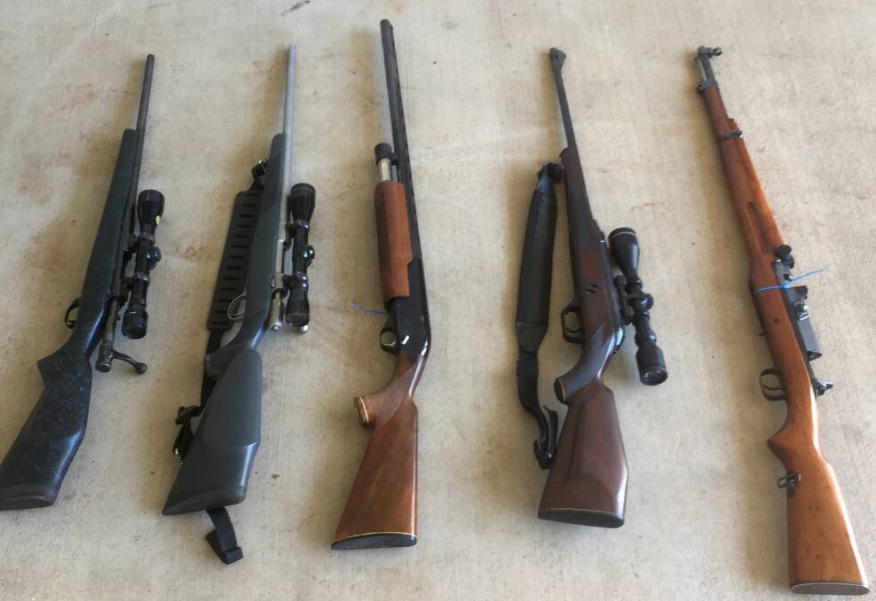 Some of the rifles alleged to have been seized. Photo: QPS. 