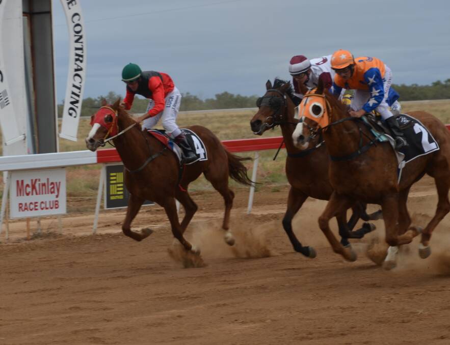 FACE PACED: A race meeting in McKinlay. Photo: Derek Barry.