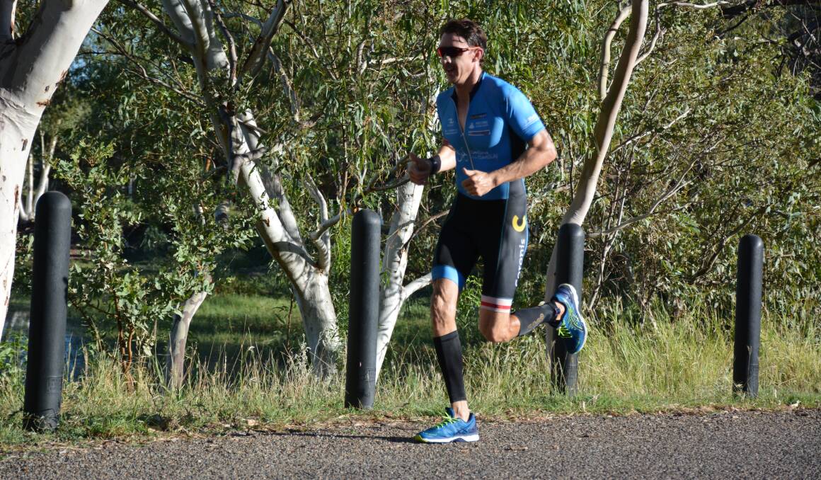BATTLING ON: Mark Thinee closes in on the finishing line at Lake Moondarra on Sunday morning. He has won all three rounds of the Race to the Creek series. Photo: Chris Burns.  