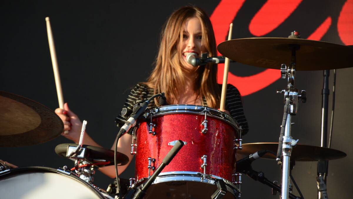 San Cisco's drummer Scarlett Stevens looks like she's enjoying performing to the Mount Isa crowd. 