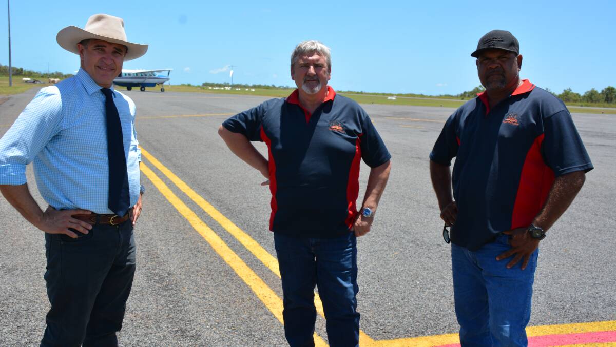 ON SITE: State Member Rob Katter examines the damaged airstrip on Mornington Island in March, with the Mornington Shire Council's CEO Frank Mills and mayor Brad Wilson. Photo: Chris Burns. 