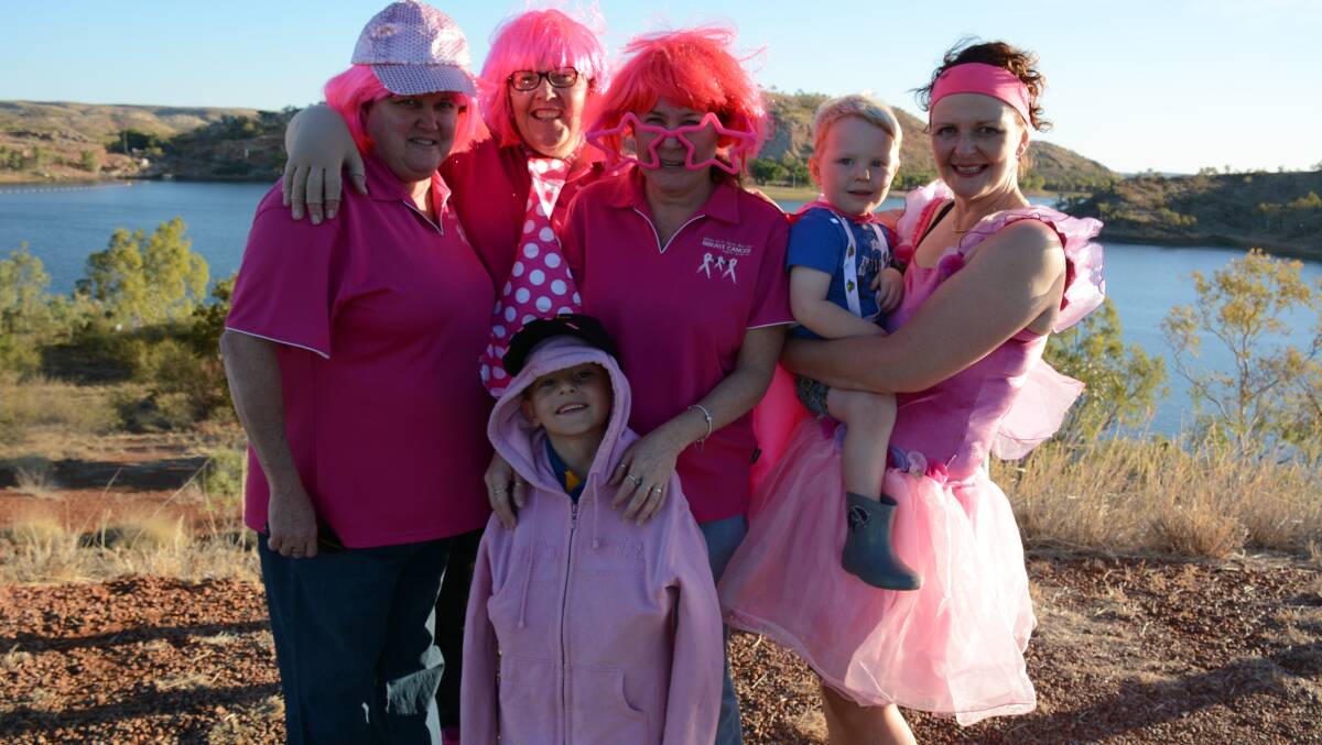 DRESS CODE: Tania Gilmore, Trish Olsen, Pam Coutts, Isaac Godwin, 7, Ashton Godwin, 3, and Juanita Godwin are ready for the Pink Ta Tas. Photo: Chris Burns. 