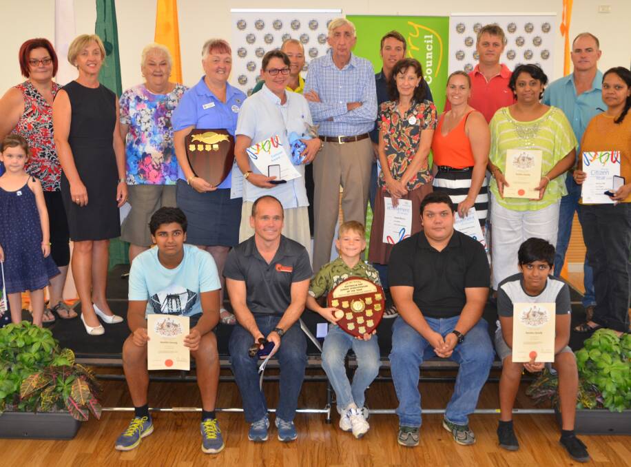 RECOGNISED: Award winners with their awards are pictured with former councillors at the 2016 Australia Day Ceremony. Photo: Derek Barry. 