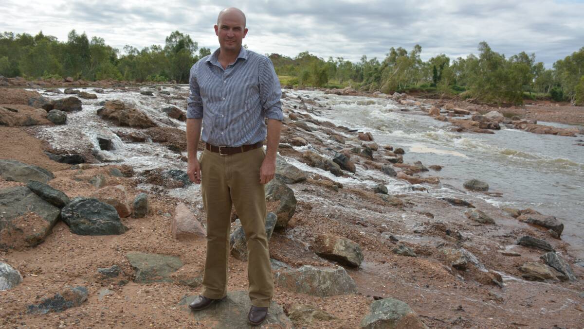 Cloncurry mayor Greg Campbell at the weir shortly after the 2016 wet season. Photo: Chris Burns. 