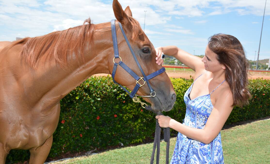PATS: Racehorse Duke's Delight and Danielle Yamaguchi. Photo: Chris Burns. 