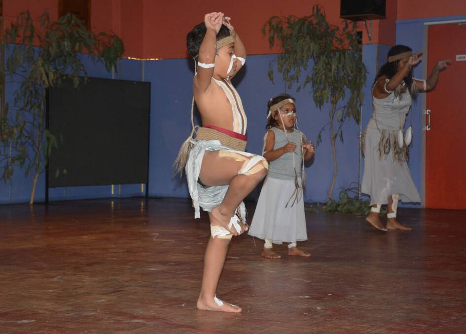 A Kalkatungu dancer balances in position. 