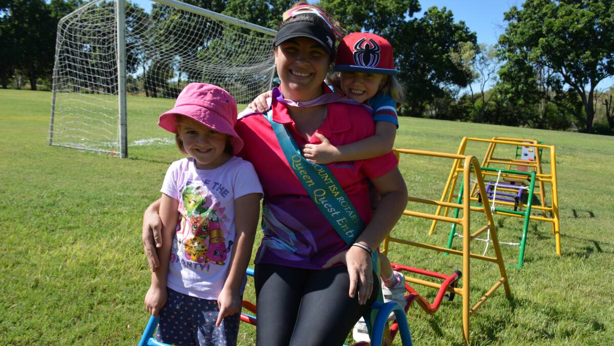 WORKOUT TIME: Aria Papadopoulos, 4, Mount Isa Rotary Rodeo Queen Contestant Sam Eaton, and Caprice Papadopoulos, 4, enjoy the boot camp. 
