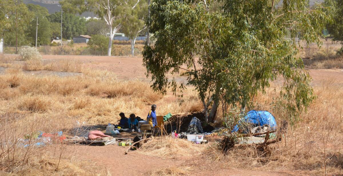 Makeshift camp: riverbed dwellers sit in the riverbed near the Alma Street crossing. When water is in the river it flows to the city's water supply, Lake Moondarra. 