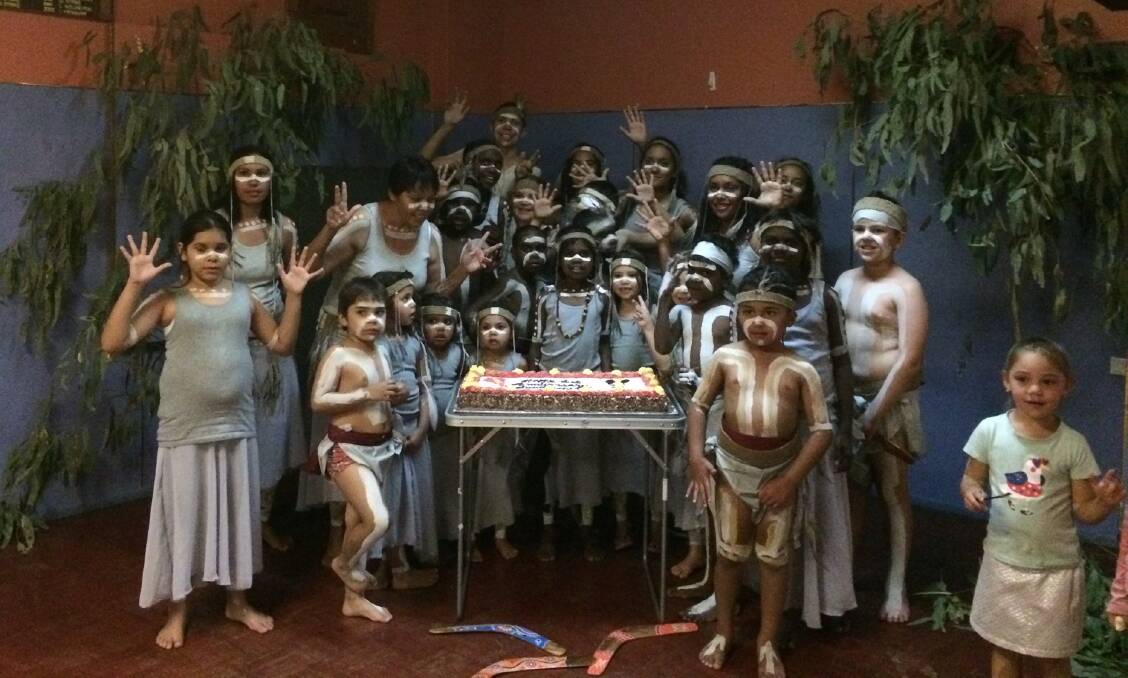 The Kalkatungu Sundowners celebrate the one year milestone since they formed, with a celebratory cake on Saturday night. Photo: Supplied.