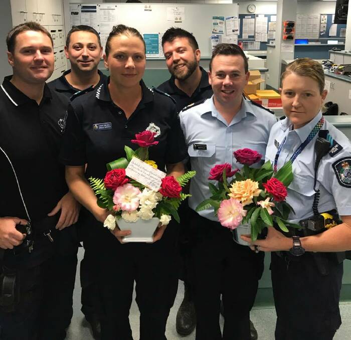 POLICE SUPPORTED: Mount Isa police officers have received flowers from the Christian Outreach Centre to acknowledge the loss of a QPS colleague. Photo: QPS. 