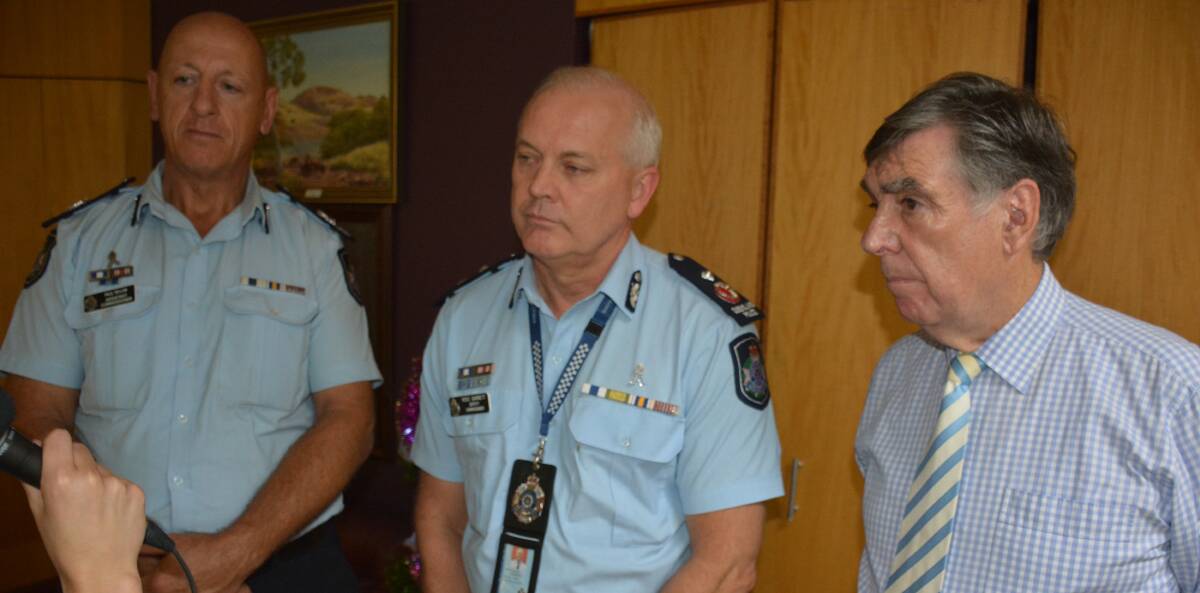 In town: Assistant commissioner Paul Taylor, deputy commissioner Ross Barnett and Mount Isa Mayor Tony McGrady speak on youth crime.  