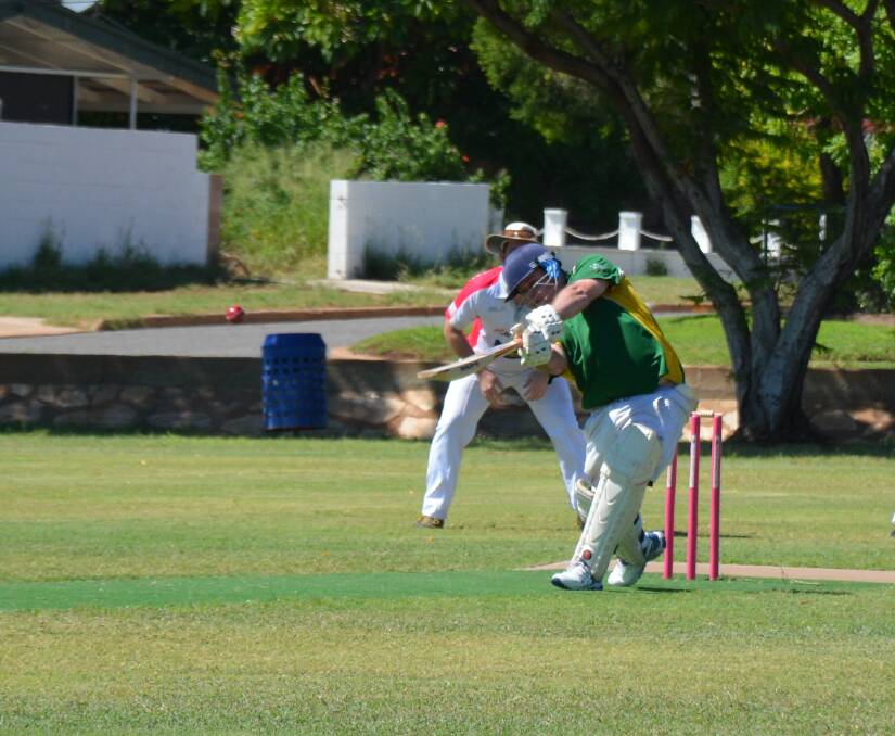 SHORT-LIVED: Bulls batsman Lewis Read hits the ball, but is soon out from the bowling of Luke Graefe. Photo: Chris Burns. 
