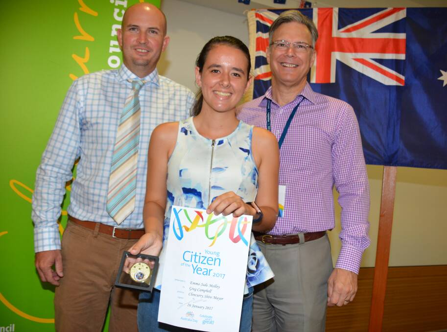 YOUNG CITIZEN OF THE YEAR: Cloncurry mayor Greg Campbell, young citizen of the year Emma-Jade Molloy holding her award, and ambassador Dr Tim Baker at teh Cloncurry Australia Day Ceremony. Photo: Chris Burns. 