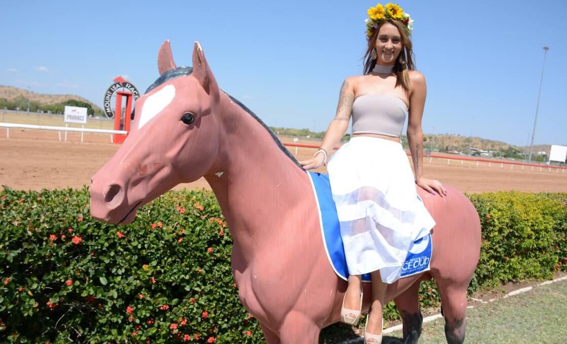 KEEN TO START: Spring races sponsor Bangin Tans owner Jess Siely is keen for the racing to begin. She wears a flower crown made by Sissi's Flowers. Photo: Chris Burns. 