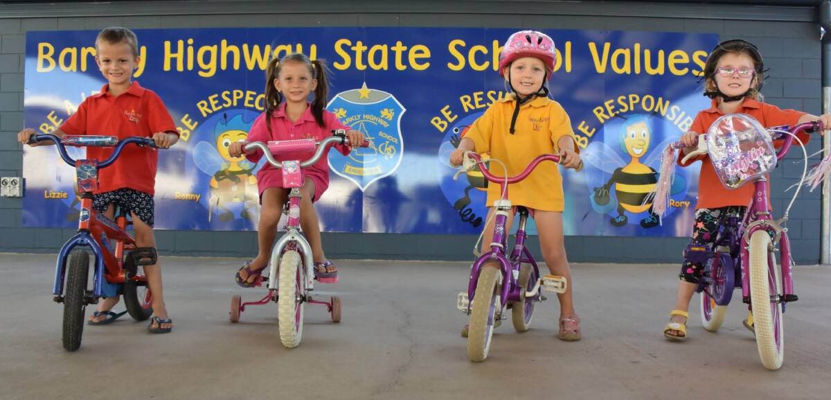 GEARING UP: Happy Valley kindy kids Matthew Wagh, Sienna Wagh, Olivia Wilcox and Jasmine Grummit are getting ready to race at this Saturday's bike-a-thon. Photo: Danaella Wivell
