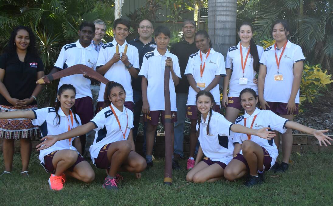 ALL SMILES: Students from the Indigenous Youth Development Program pose with artist Sheree Blackley, KAP Member for Mount Isa Rob Katter, Director of Kalkadoon Will Blackley and musician Shaun Major. Photo: Danaella Wivell