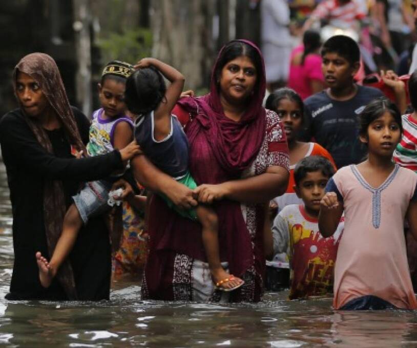WIDESPREAD DEVASTATION: Sri Lanka has been hit with torrential rain, leaving parts of the country isolated by flood water. Photo: AP