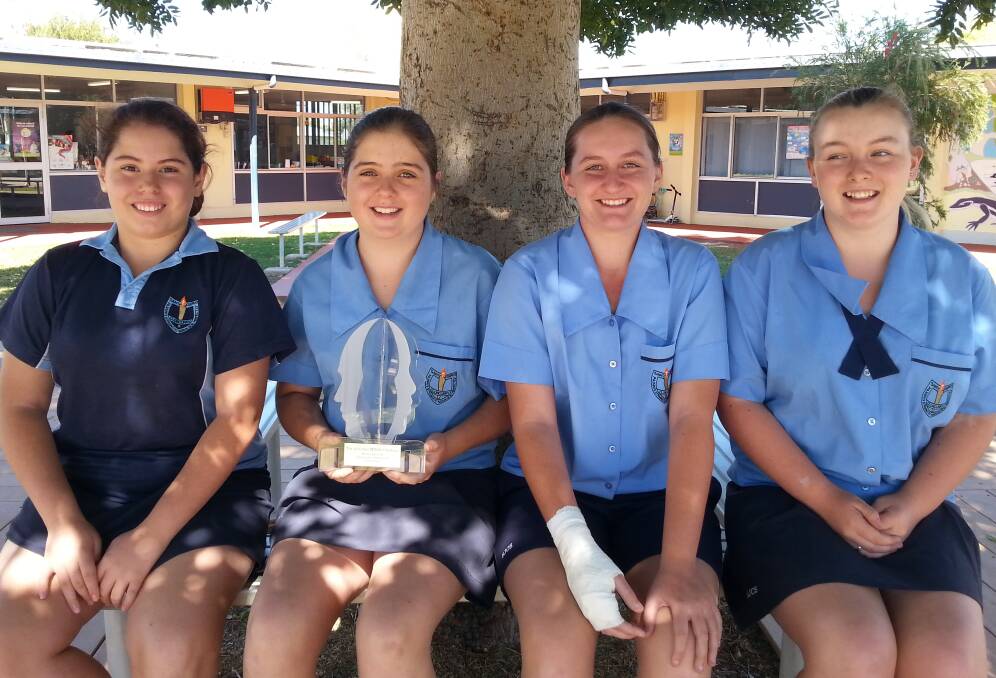 BRIGHT SPARKS: Annie MacNamara, Year 7, Hayley Bowden, Year 8, Lalaine Payne, Year 8, and Jodie Shaw, Year 8, are fundraising for their trip to the state finals.