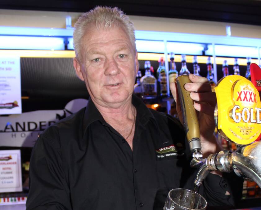 ON TAP: Overlander Hotel duty manager Andy Allen says patrons are still reaching for a beer to quench thirsts, contrary to new research. Photo: ANDREA CROTHERS.
