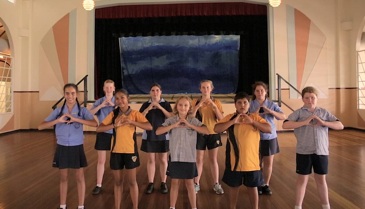 CURRY KIDS: A scene from the music video for Cloncurry's new song, made with students to celebrate the town's 150th anniversary. Photo: Small Town Culture
