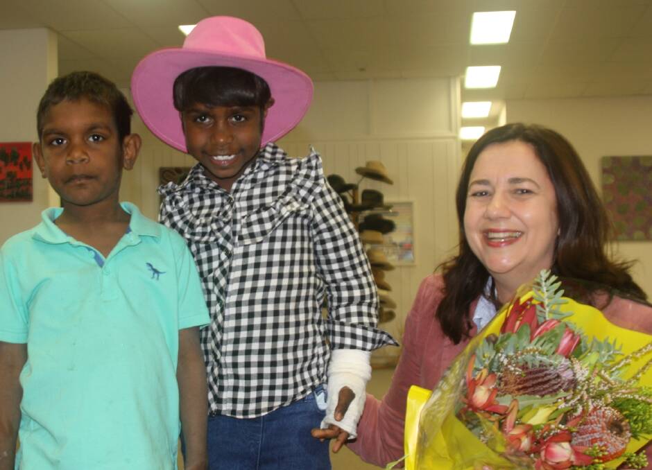 PREMIER'S PRESENT: Queensland Premier and Minister for the Arts, Hon. Annastacia Palaszczuk, with Urandangie kids, Isaac and Takara, at the Desert Borders art show in Mount Isa on Saturday. Photo: Esther MacIntyre 