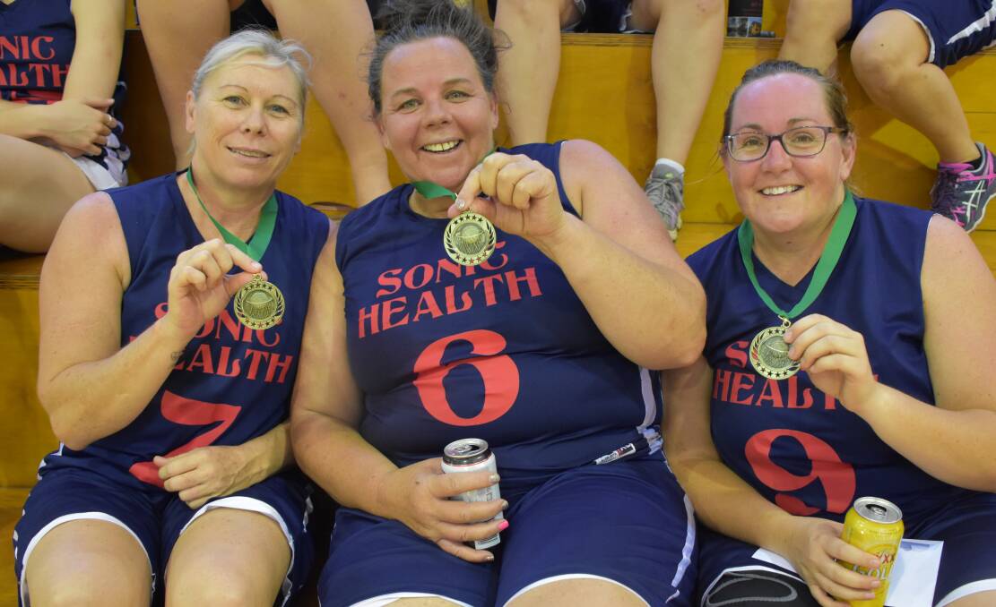 CHUFFED: Tara Glasscock, Tanya Hale, and Kylie Toms (MVP) from Sonic Health, thrilled with their win in the women's A Reserves at Mount Isa Basketball Association Winter grand finals.  Photo: Esther MacIntyre