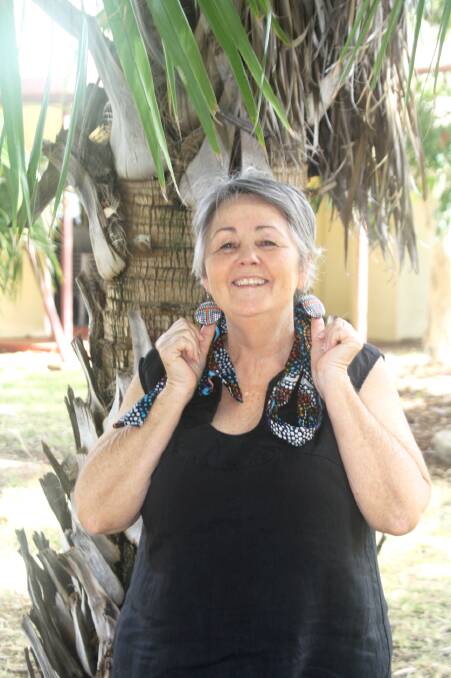 Judy wears her mum's earrings with pride at the Kalkadoon Keeping Place during Naidoc Week in Mount Isa.
