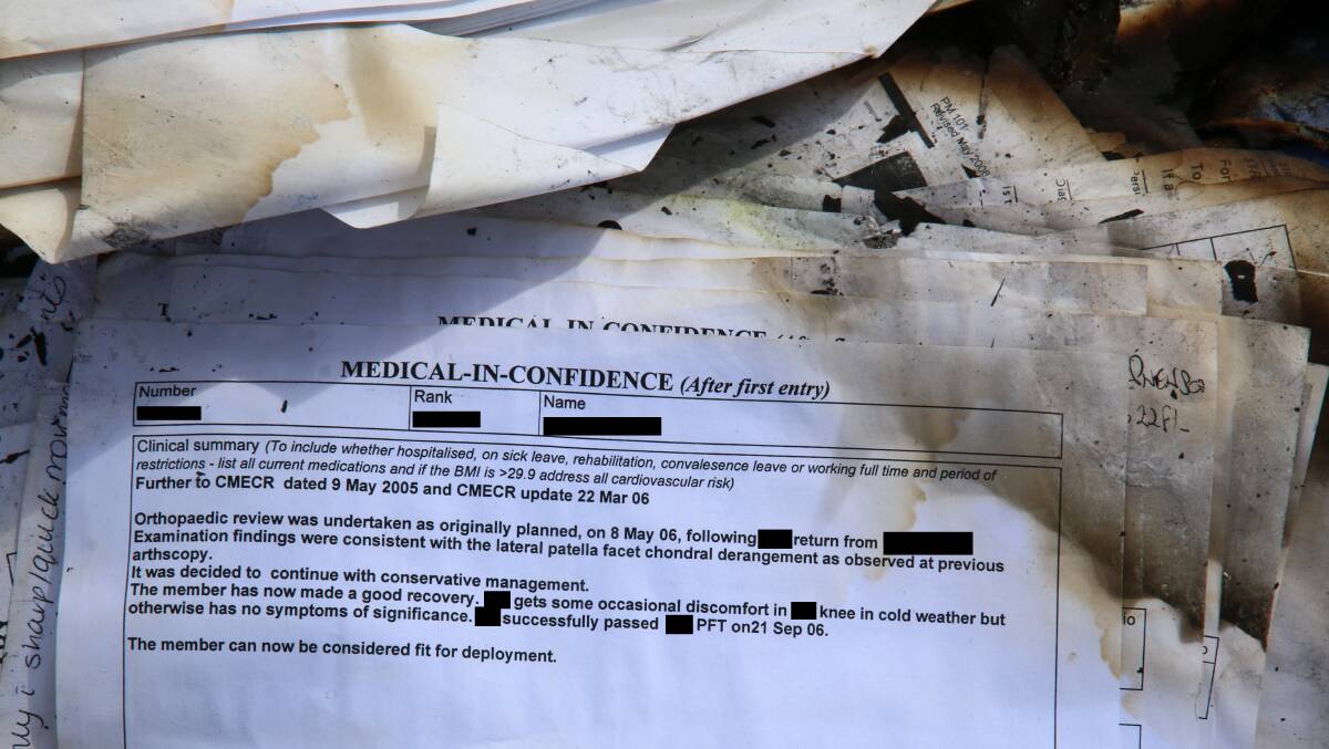 Military discharge papers and medical records were among the rubbish found on the side of the road. 